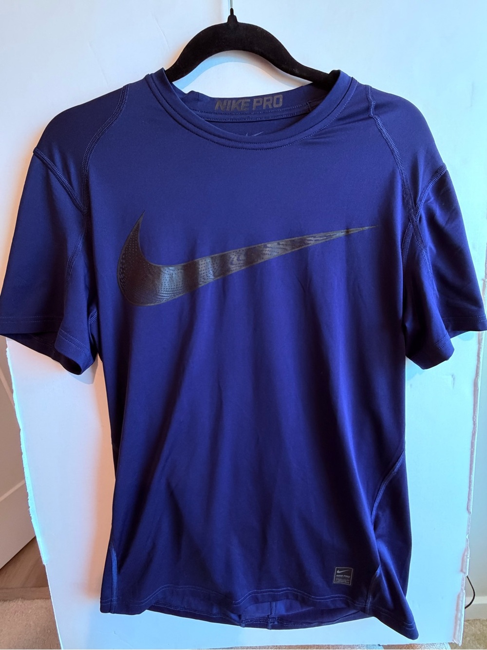 Nike Short-Sleeve Athletic Tee in Deep Purple with Black Swoosh